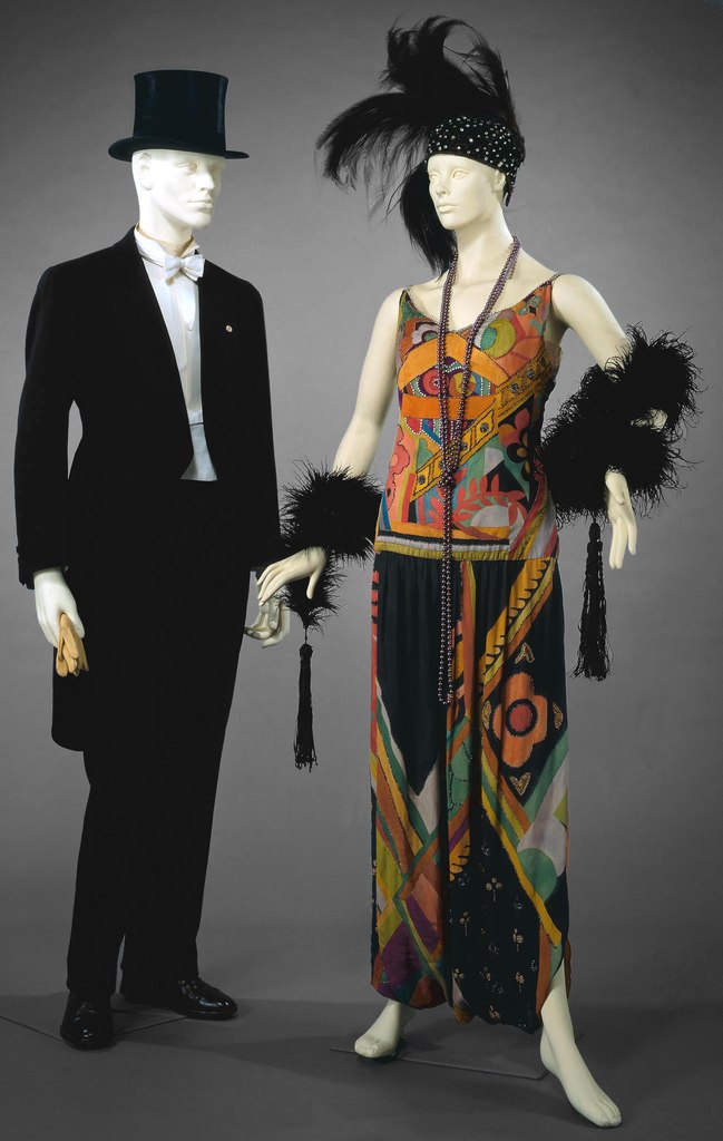 Tailcoat, tophat, vest, trousers, dress with design by Sonia Delaunay, (ca. 1920)